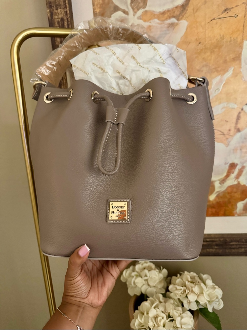 Dooney & Bourke Lucca Leather Drawstring Shoulder Bag in the color Elephant.